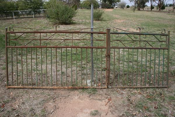 S_IMG_1857.JPG - Steel Gates, made in early 1930's, to fit a spacing of 10 feet (3048 mm) between gate posts. Construction is of steel tubing and flat steel bar. Only fair condition, but repairable. The bottom steel tube on the larger gate is rusted through from resting on the ground for many years. Pick Up Only. $100
